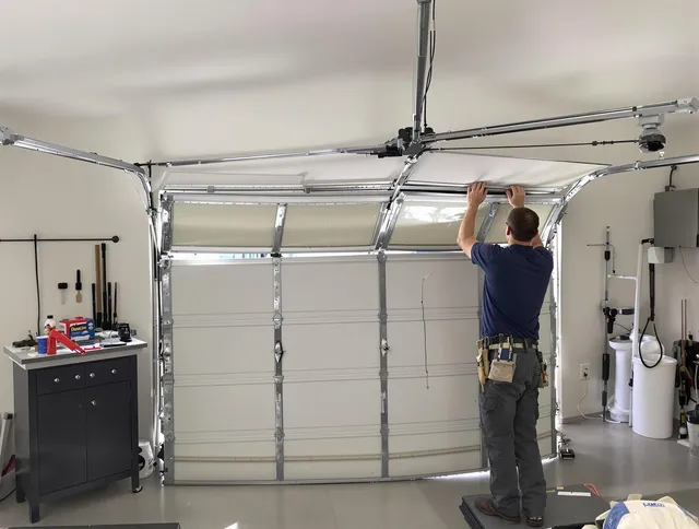 Old Saybrook Garage Door Repair specialist performing precise section replacement on Old Saybrook garage door