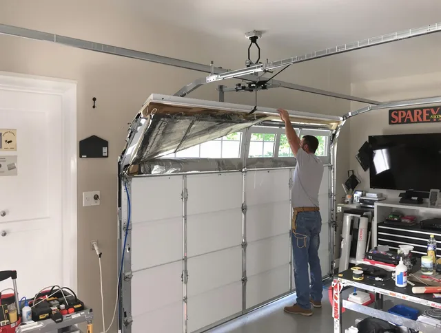 Garage door section replacement by Old Saybrook Garage Door Repair in Old Saybrook